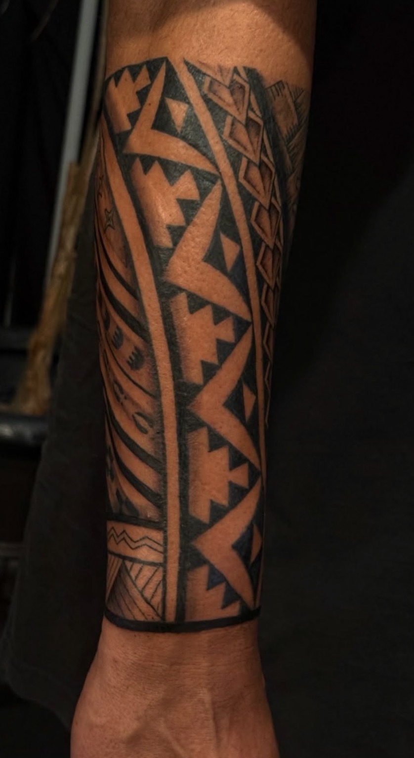 Polynesian forearm tattoo by Tanner Magbanua – IslandTAT San Diego