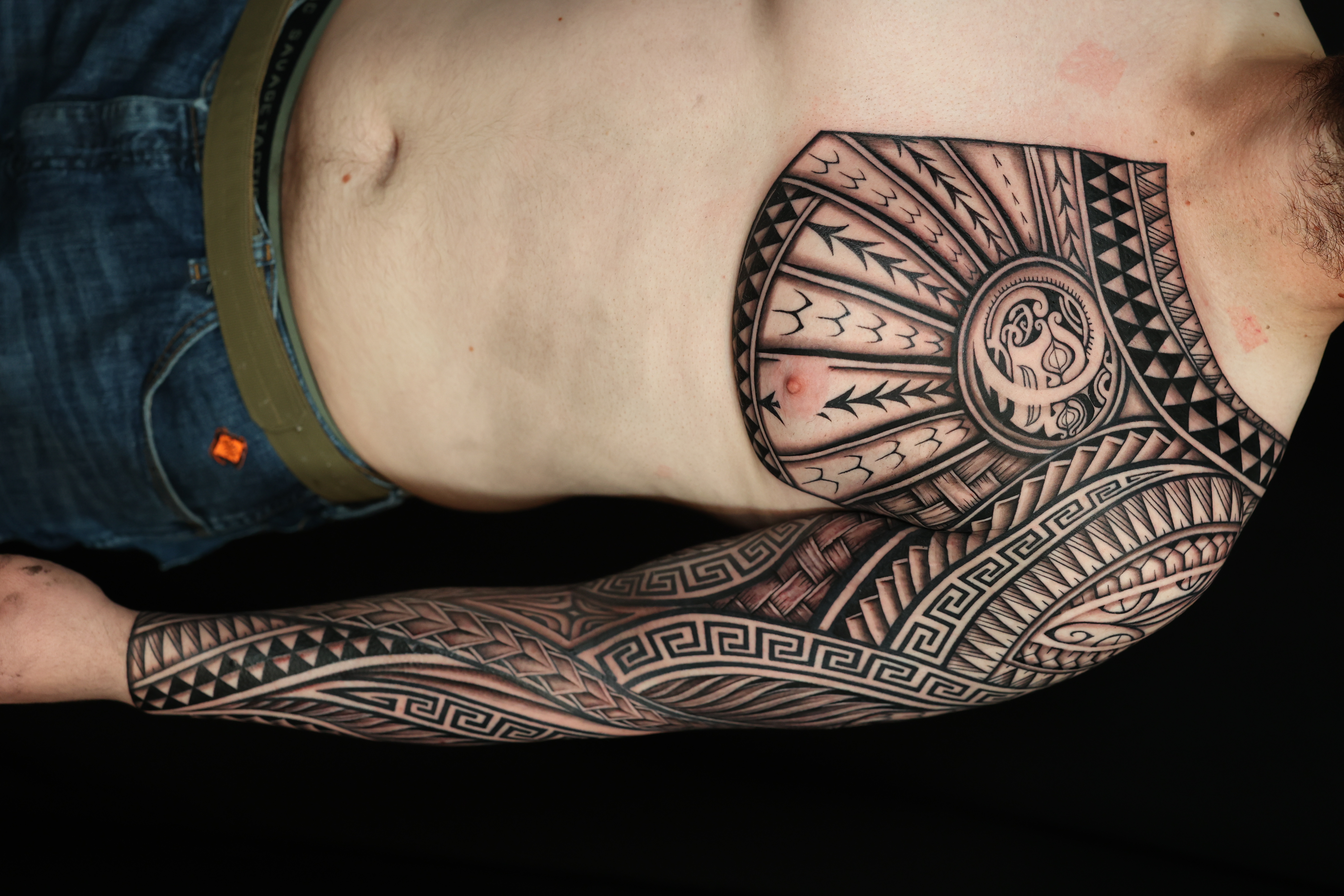 Polynesian chest pieces tattoo by Joshawa Elsas – IslandTAT San Diego