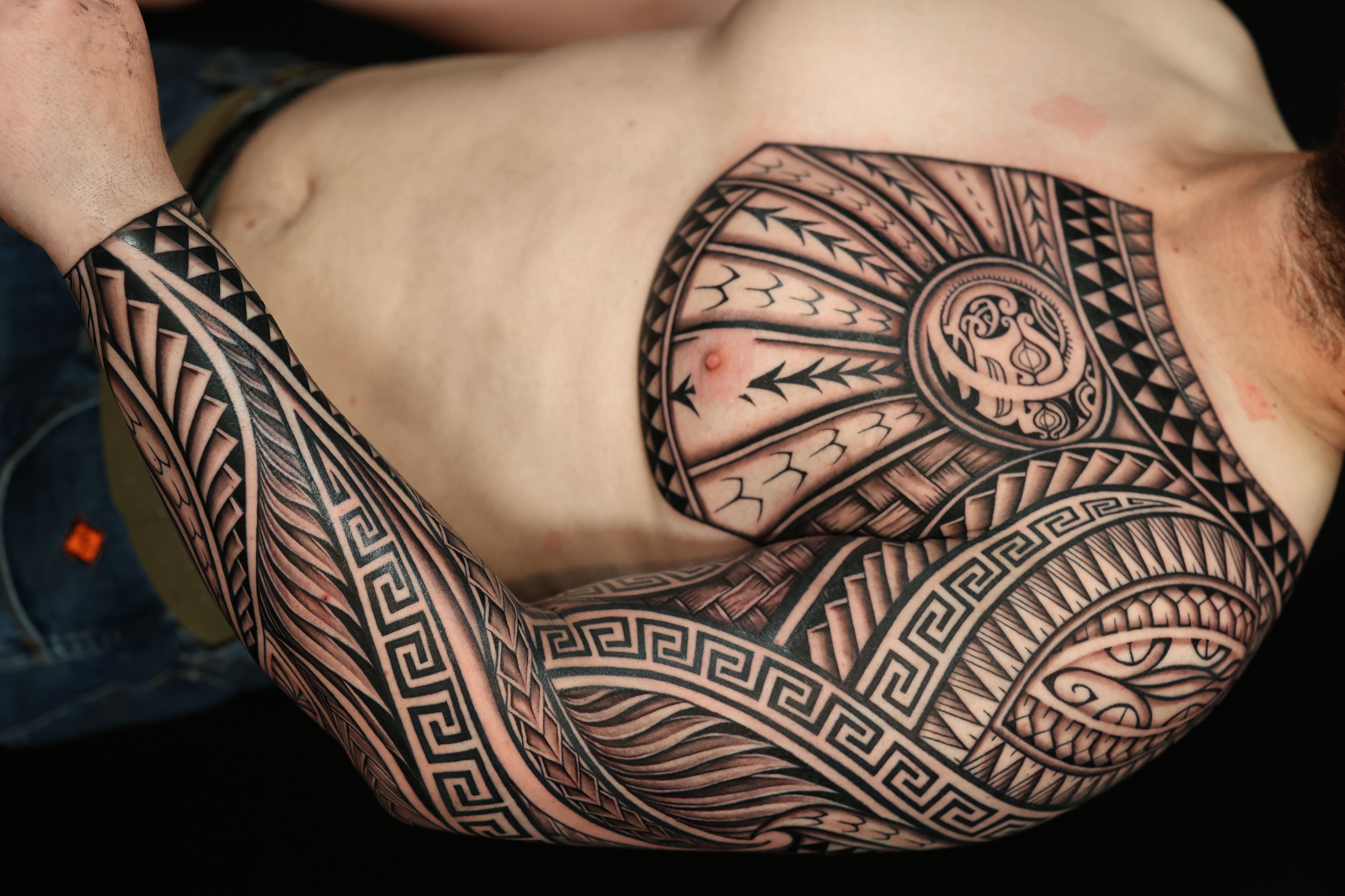 Polynesian chest pieces tattoo by Joshawa Elsas – IslandTAT San Diego