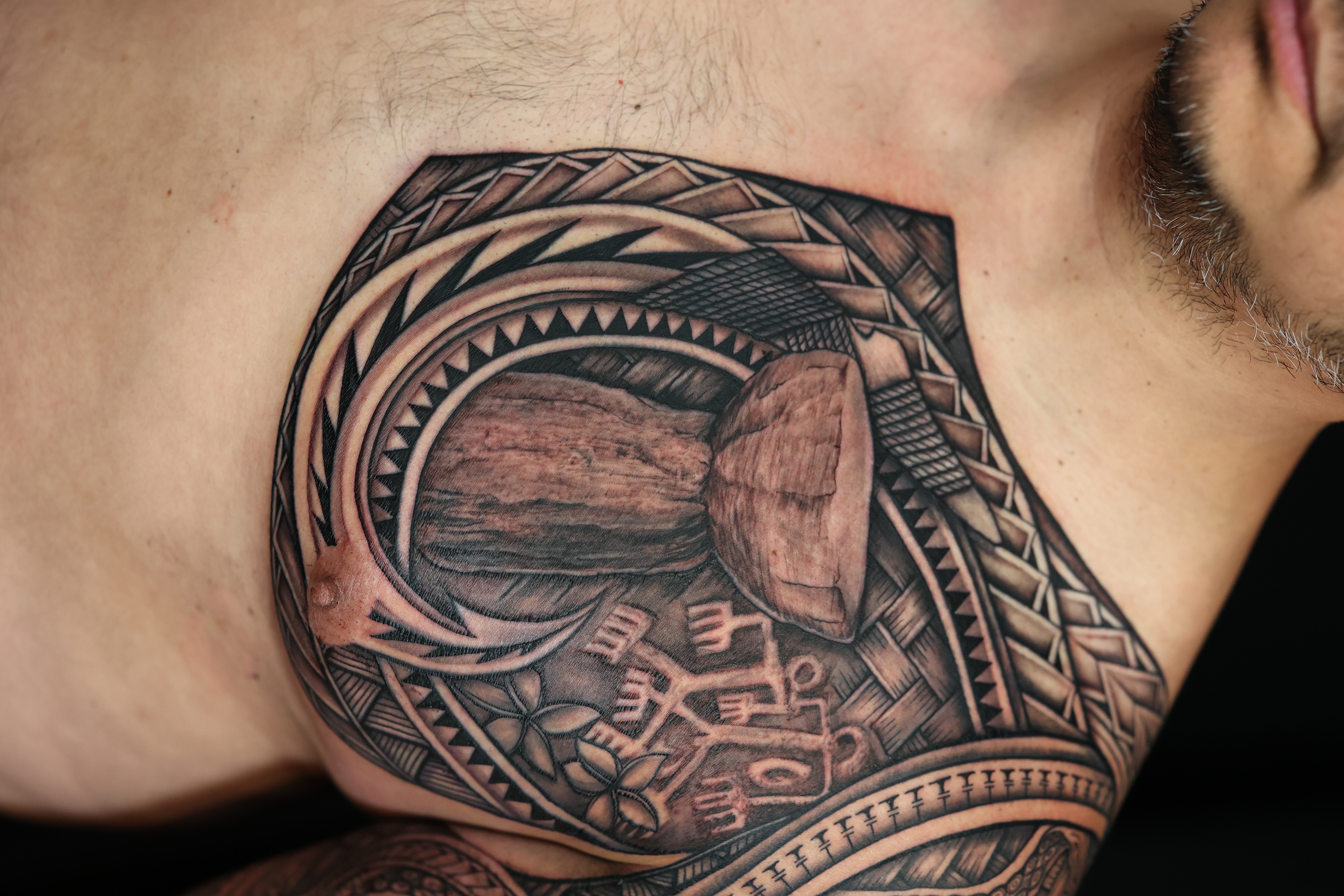 Polynesian chest pieces tattoo by Joshawa Elsas – IslandTAT San Diego