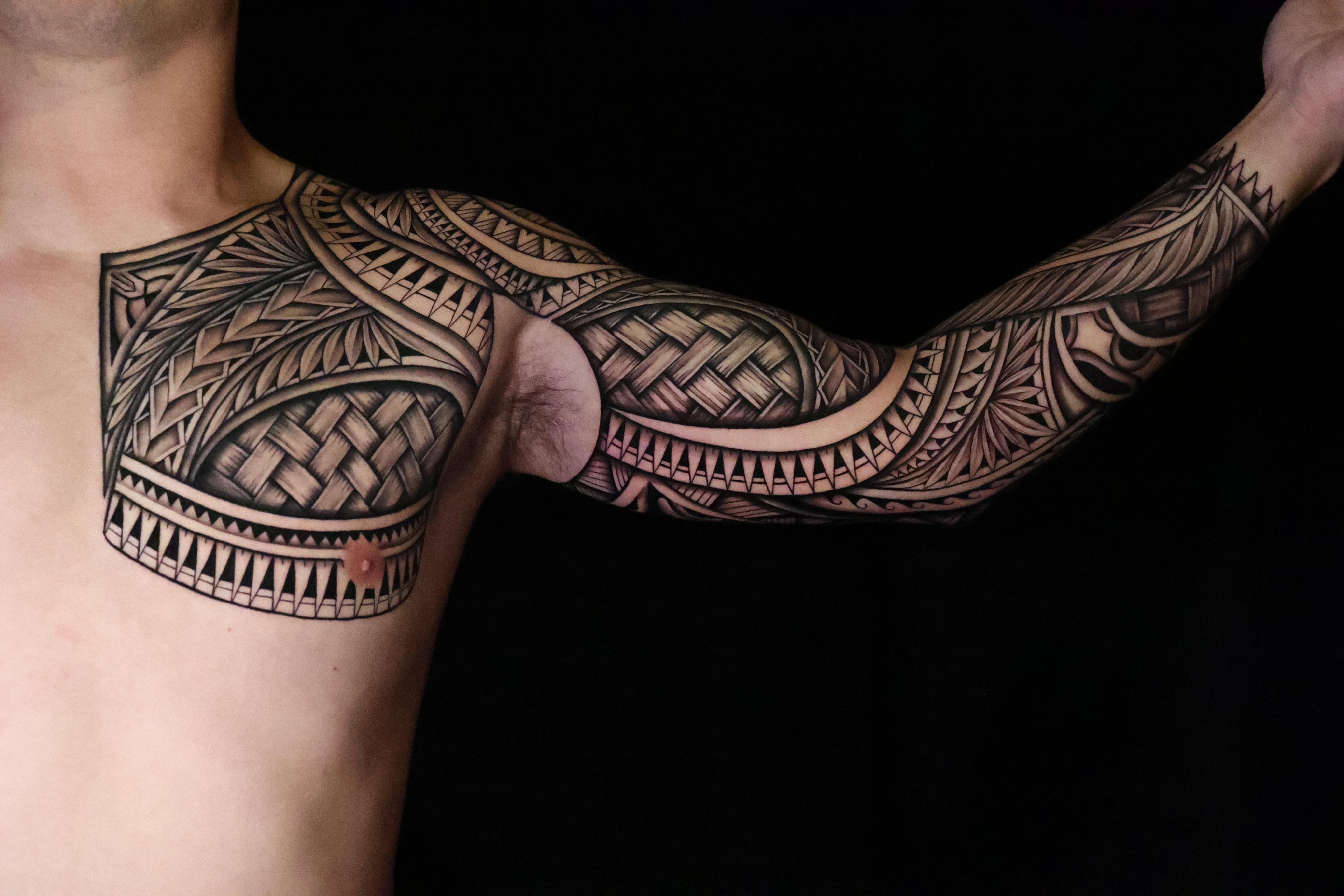 Polynesian chest pieces tattoo by Joshawa Elsas – IslandTAT San Diego