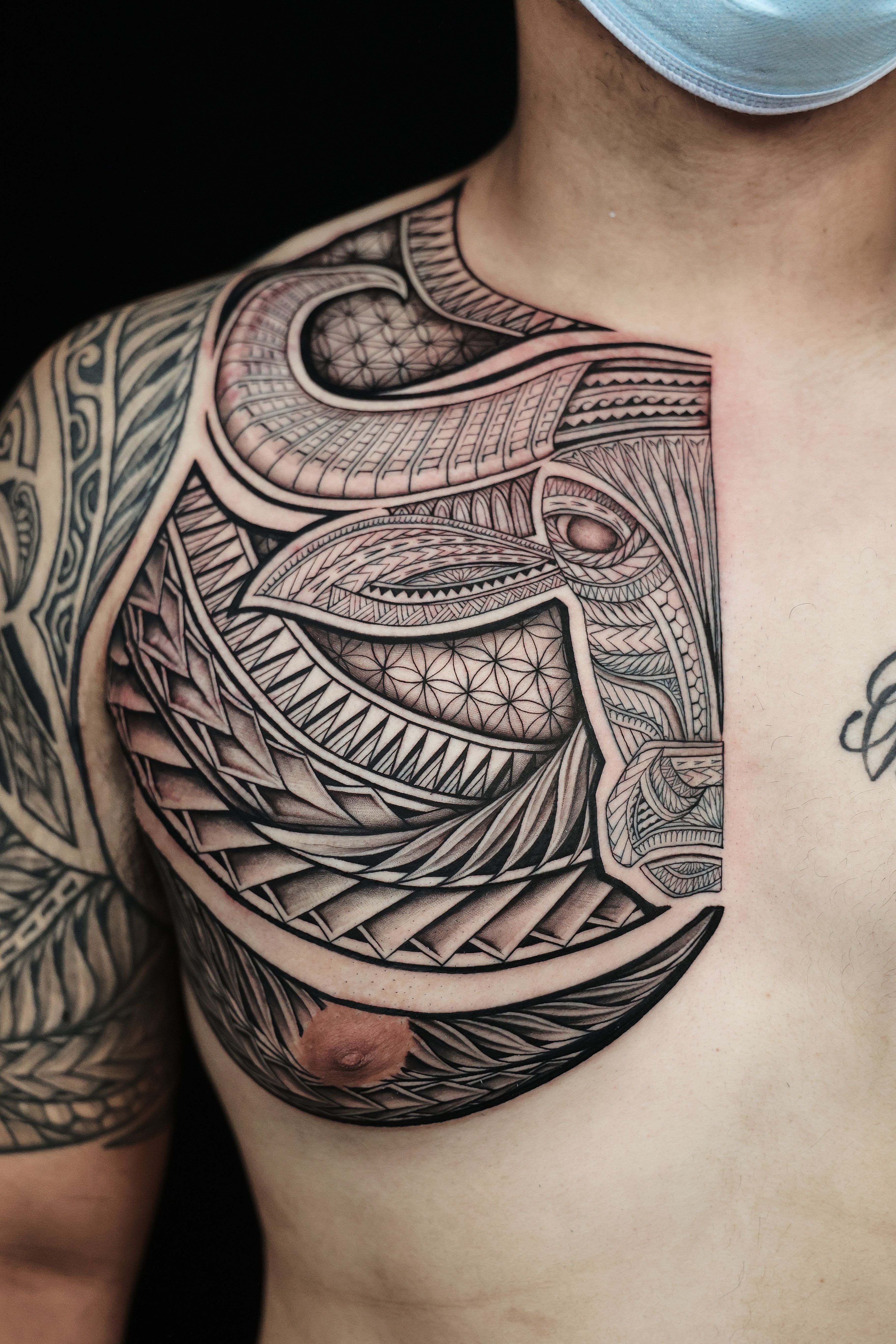 Polynesian chest pieces tattoo by Joshawa Elsas – IslandTAT San Diego