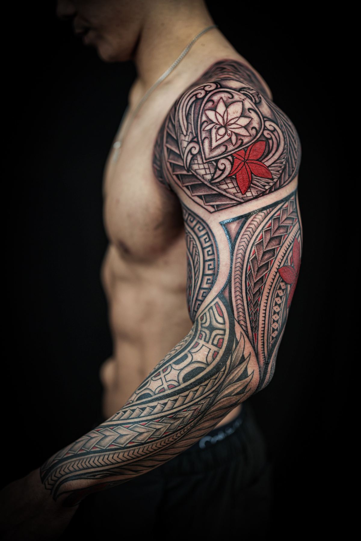 Custom Polynesian full sleeve tattoo in San Diego by IslandTAT