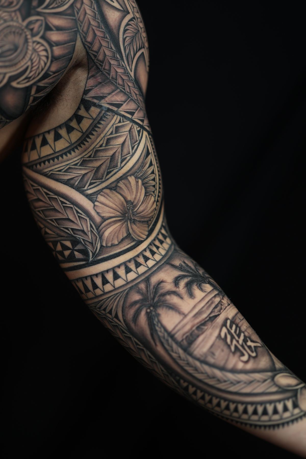 Custom Polynesian full sleeve tattoo in San Diego by IslandTAT