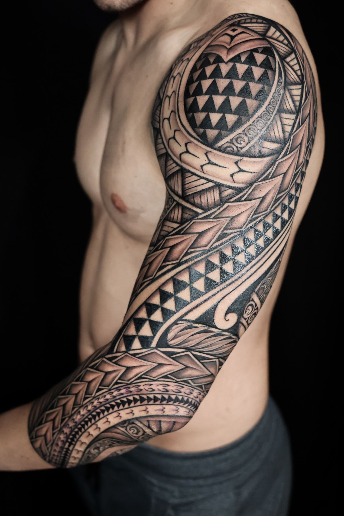 Custom Polynesian full sleeve tattoo in San Diego by IslandTAT