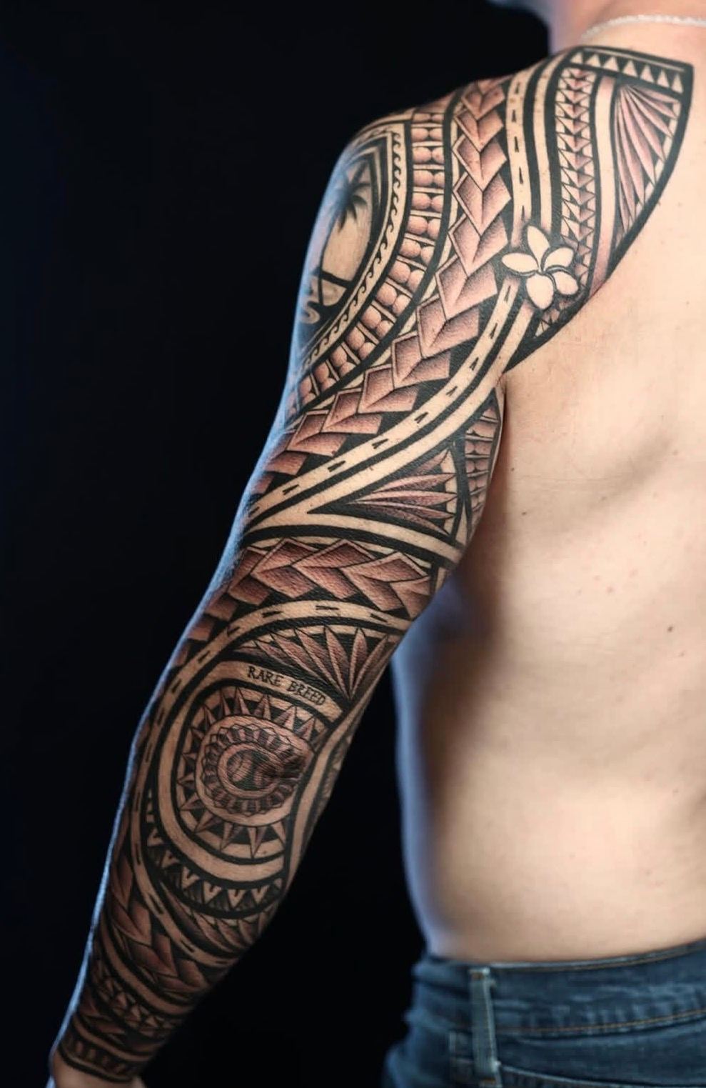 Custom Polynesian full sleeve tattoo in San Diego by IslandTAT