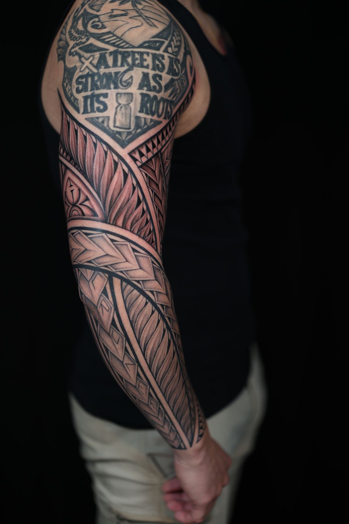 Custom Polynesian full sleeve tattoo in San Diego by IslandTAT