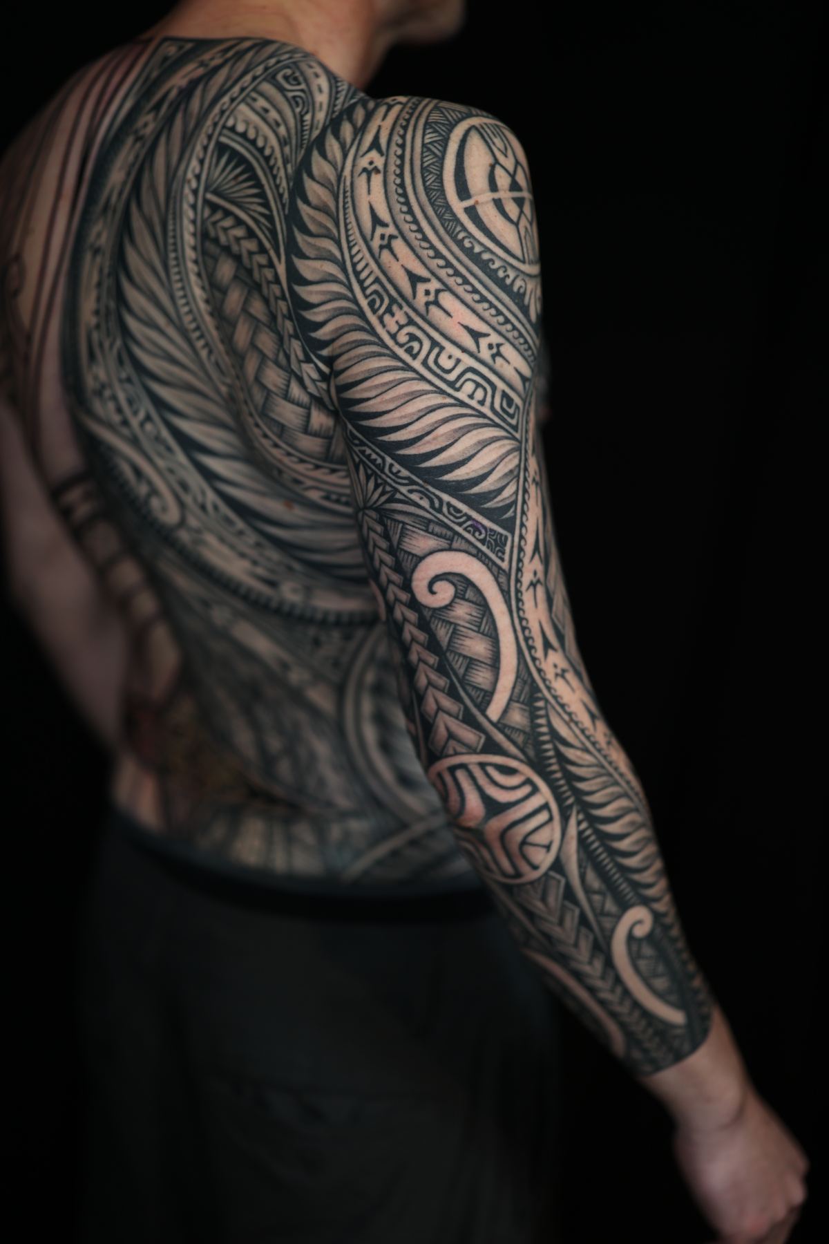 Custom Polynesian full sleeve tattoo in San Diego by IslandTAT (healed)