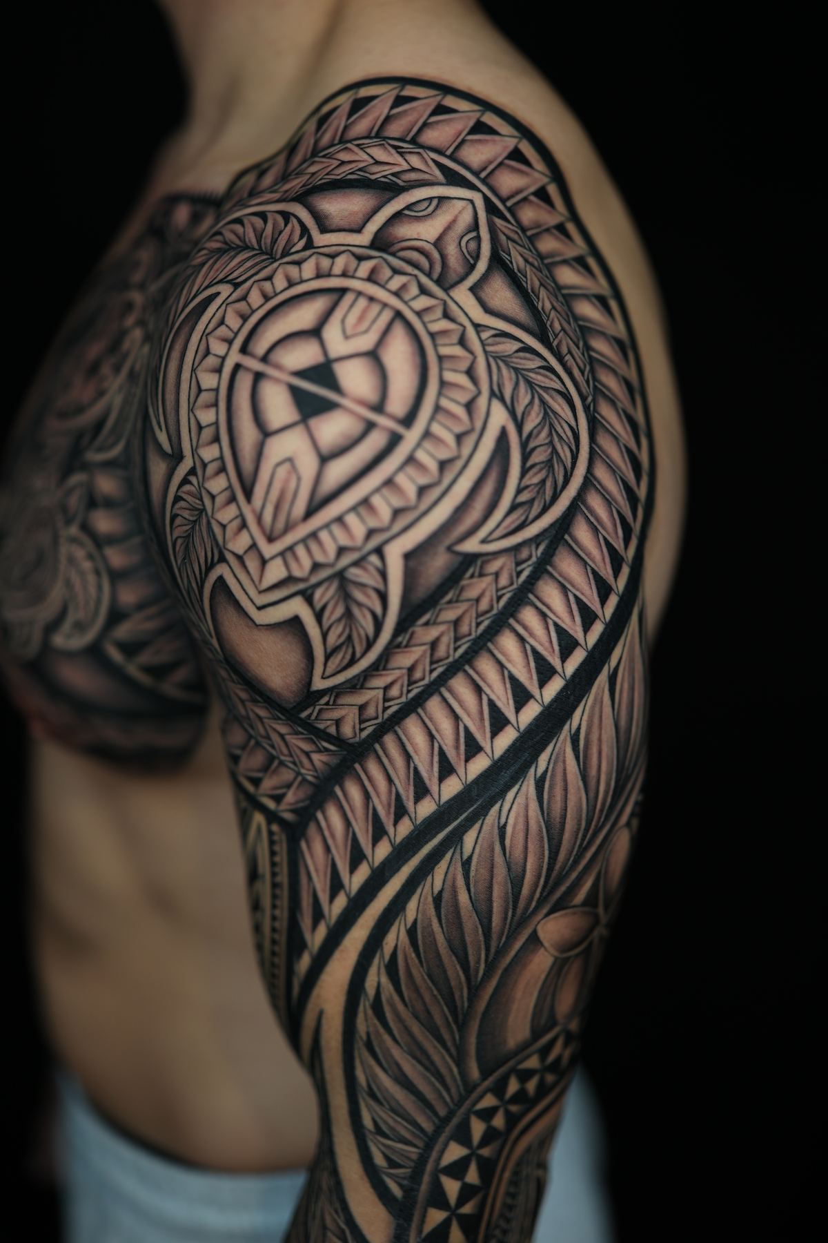 Custom Polynesian full sleeve tattoo in San Diego by IslandTAT