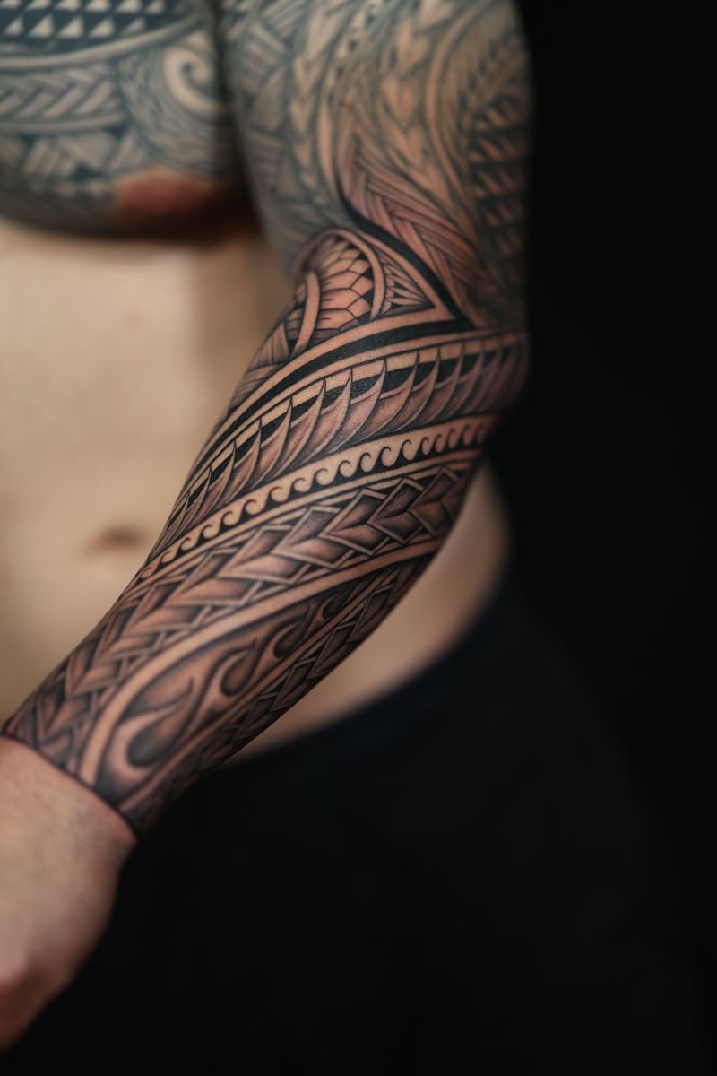 Polynesian arm sleeves tattoo by Joshawa Elsas – IslandTAT San Diego