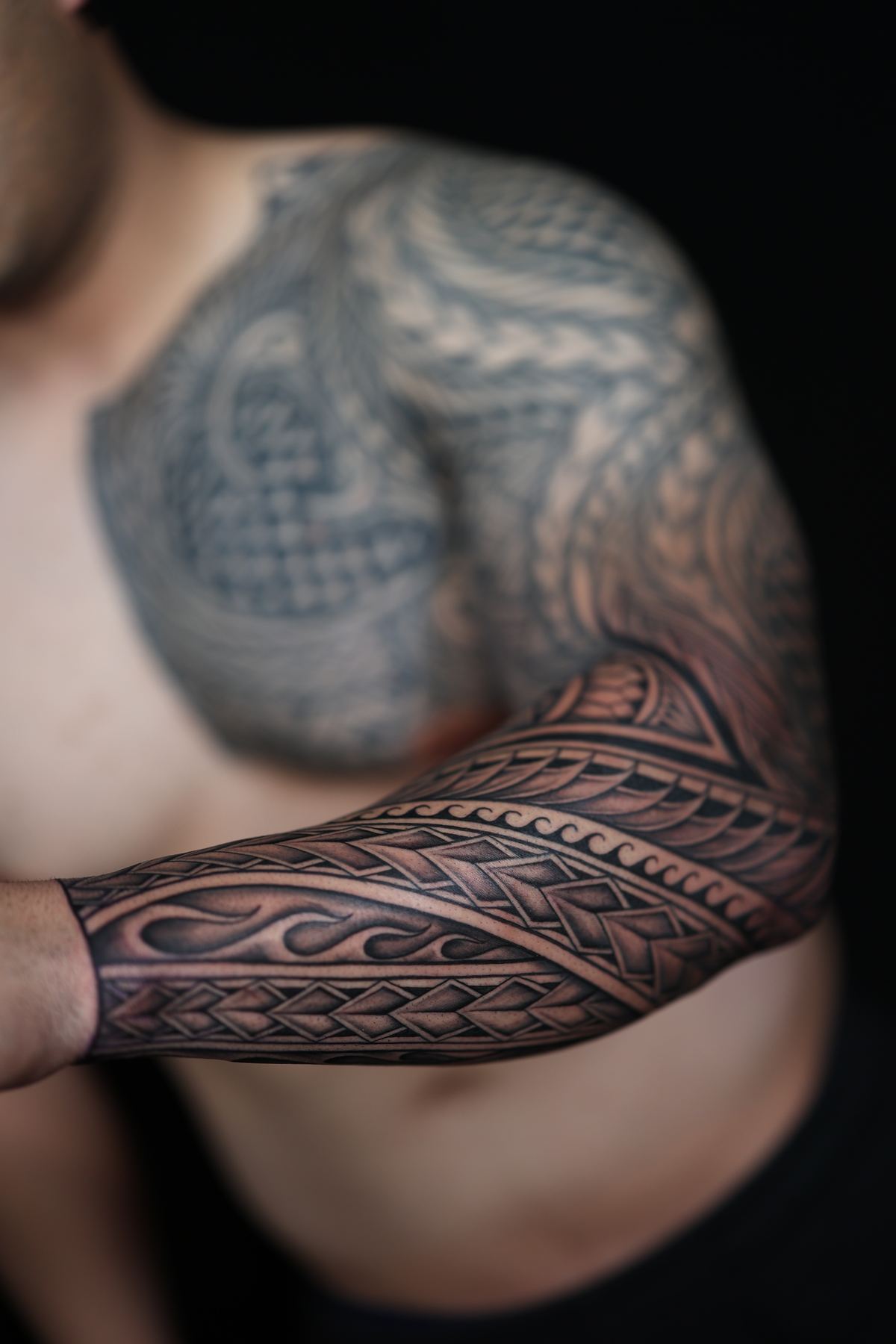 Custom Polynesian full sleeve tattoo in San Diego by IslandTAT