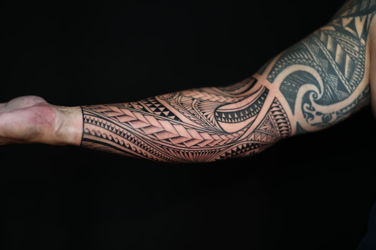 Custom Polynesian full sleeve tattoo in San Diego by IslandTAT