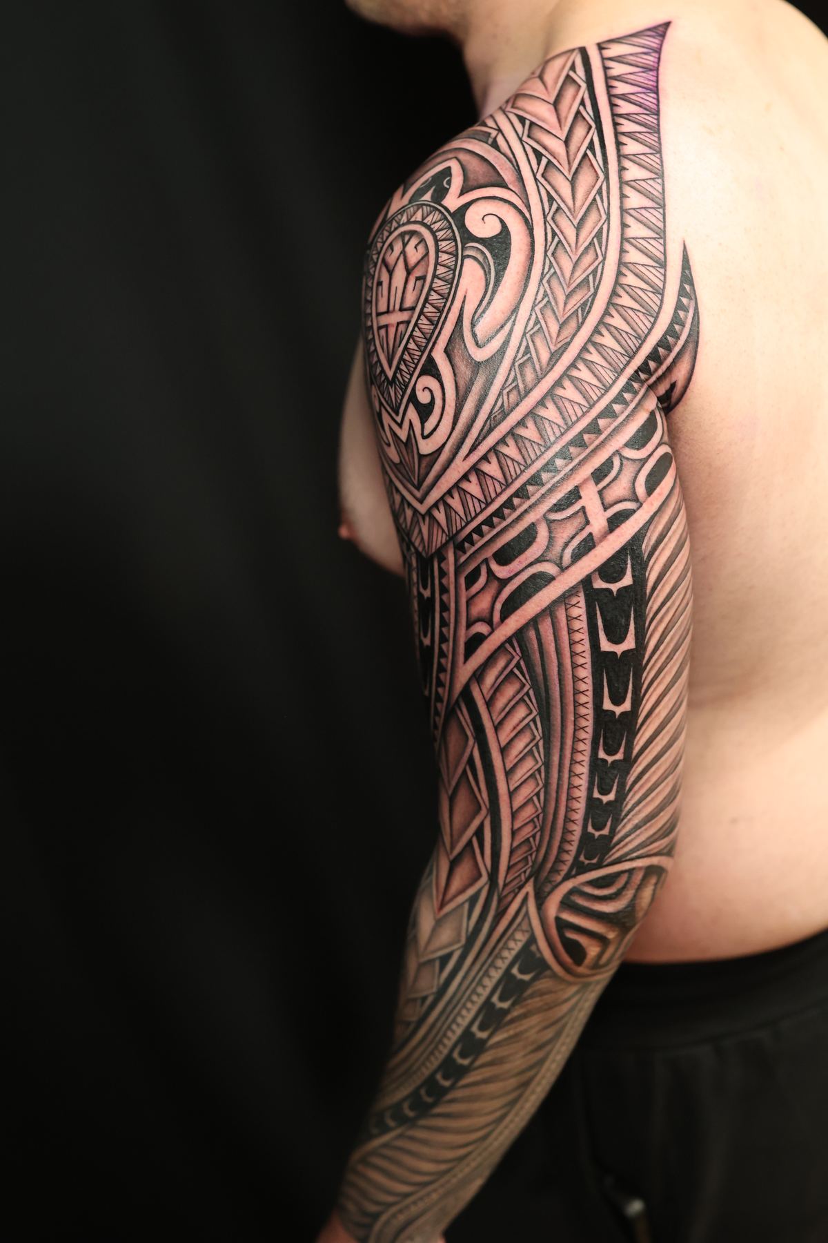Custom Polynesian full sleeve tattoo in San Diego by IslandTAT