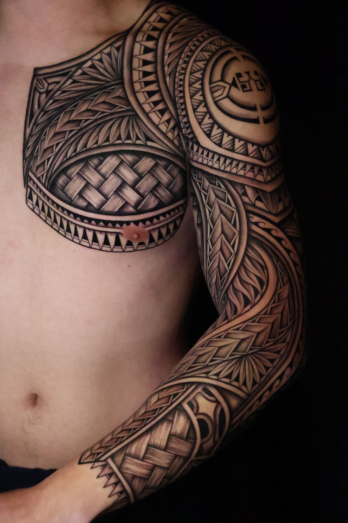Custom Polynesian chest tattoo in San Diego by IslandTAT